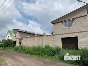 Коттедж 338м², 3-этажный, участок 12 сот.  